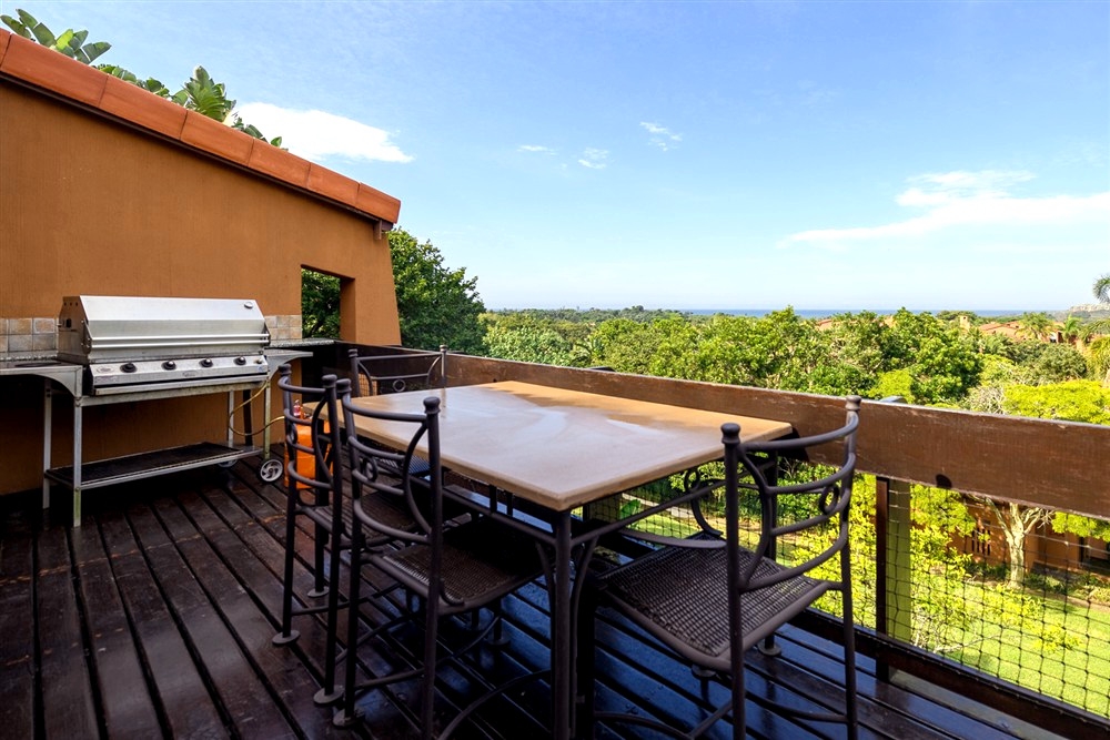 Villa 2409: Deck with sea and garden view, for the perfect sundowner and open plan lifestyle.
